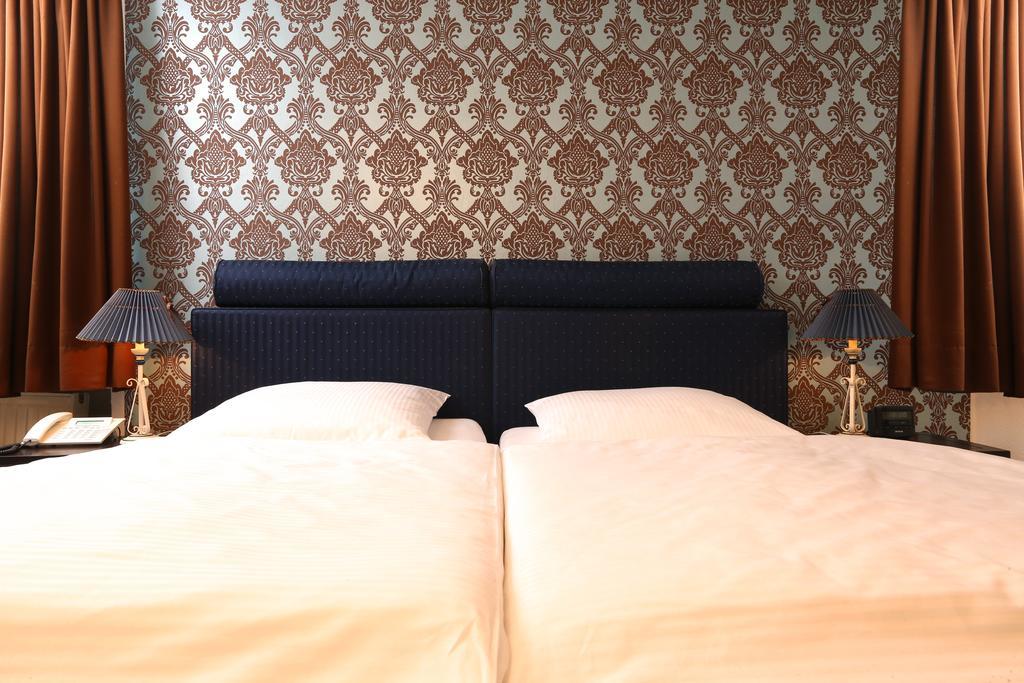 Hotel Amsterdam Гамбург Номер фото